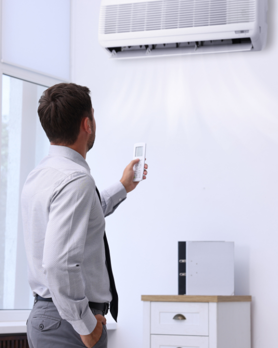 Melbourne resident enjoying energy-efficient comfort with a newly installed VEU Rebate eligible split system air conditioner. Claim your VEU Rebate today for lower energy bills